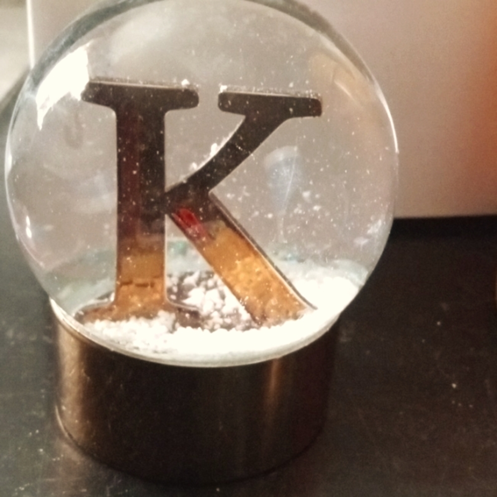 "K" snow globe